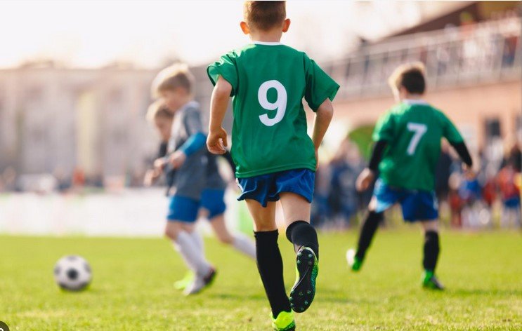 boys playing soccer